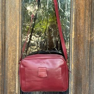 Burberry, leather purse. Prior to 1999 it was known as “Burberrys”. Vintage